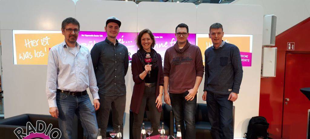 Simone Niewerth mit Handwerkern aus Hamm.